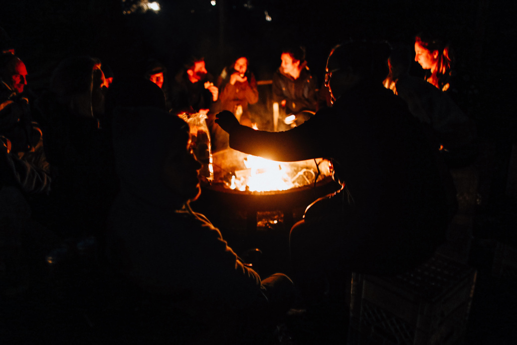 People Gathered Around the Fire Pit